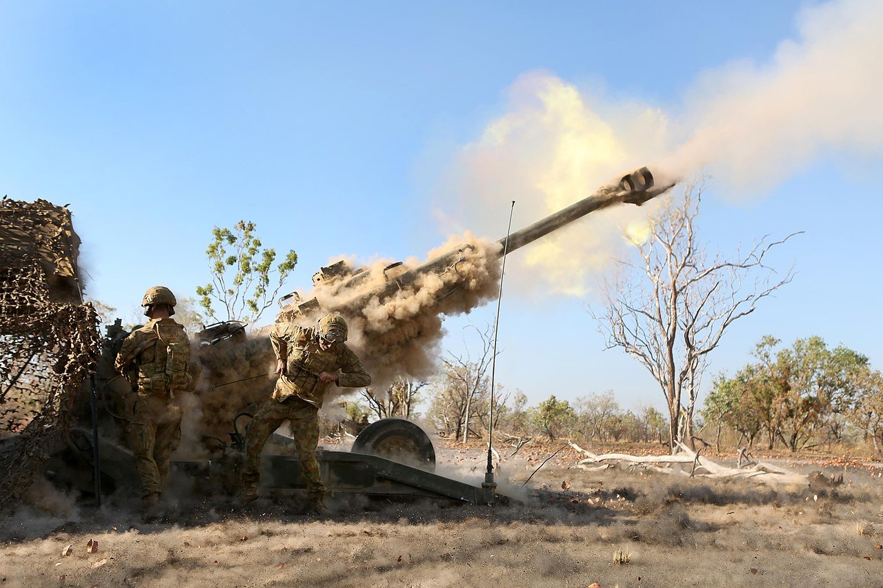 Australian Army soldiers with 8/12 Regiment, fire a M777 Howitzer - photo by Sgt. Sarah Anderson