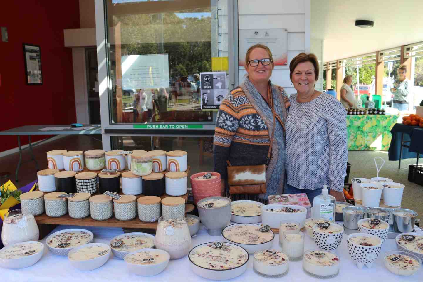 Florist and candle maker Kelly Fredline, with Community Centre volunteer Marie Heron