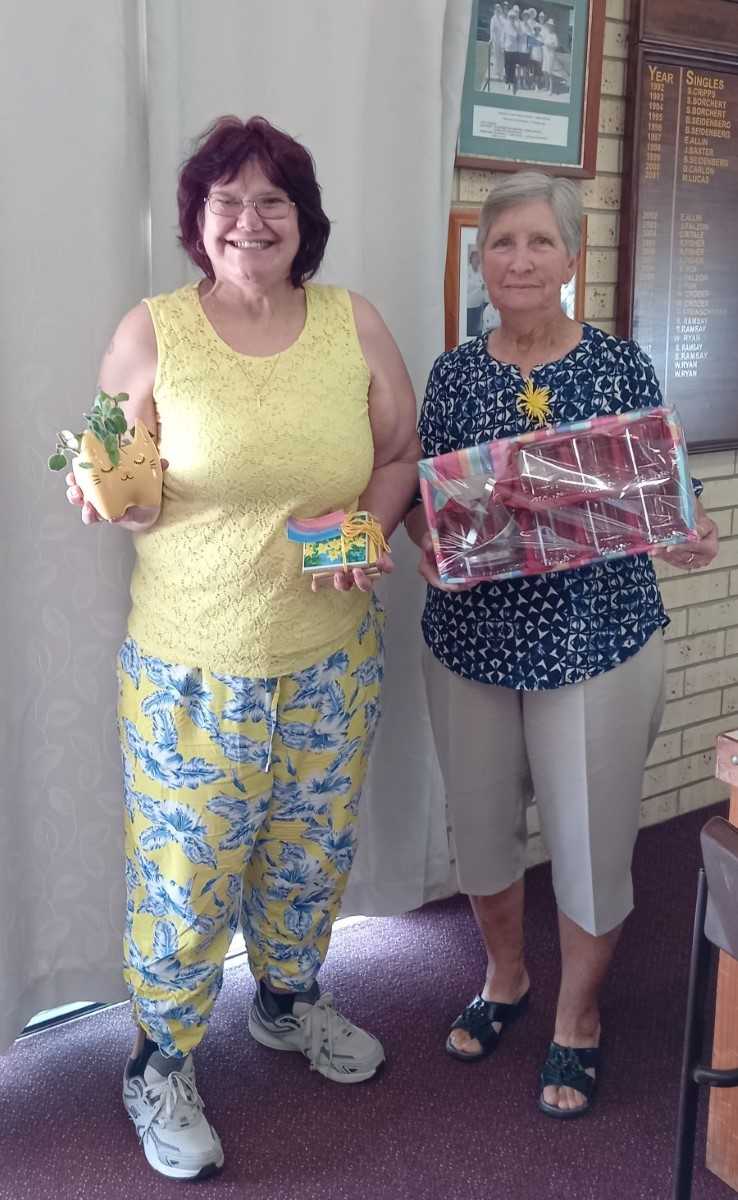 Our lucky hoy winners from Daffodil Day show off their lovely prizes