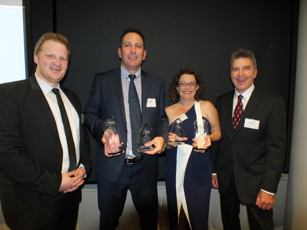 Joel Clapham from Media Super with new president  Ted Rogers (right) at the Queensland Country Press Association Annual Awards presented trophies to Heatley and Michelle Gilmore, owners of the Community News 