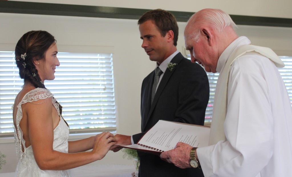 Mr and Mrs: John and Kim Dargusch exchanging vows