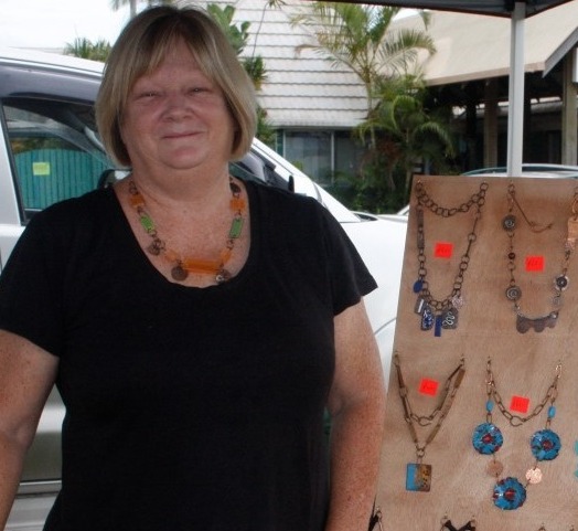 Debra Gardiner and her creations - some in copper and silver and others moulded in resin from vintage buttons, even miniatures of  her daughter's art