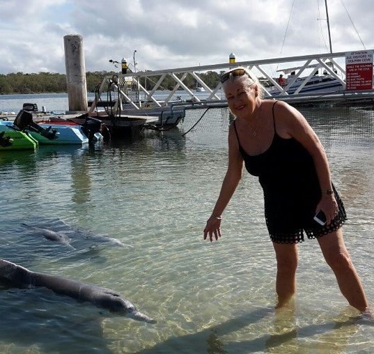 Bev from the Gold Coast visiting the Tin Can Bay dolphins