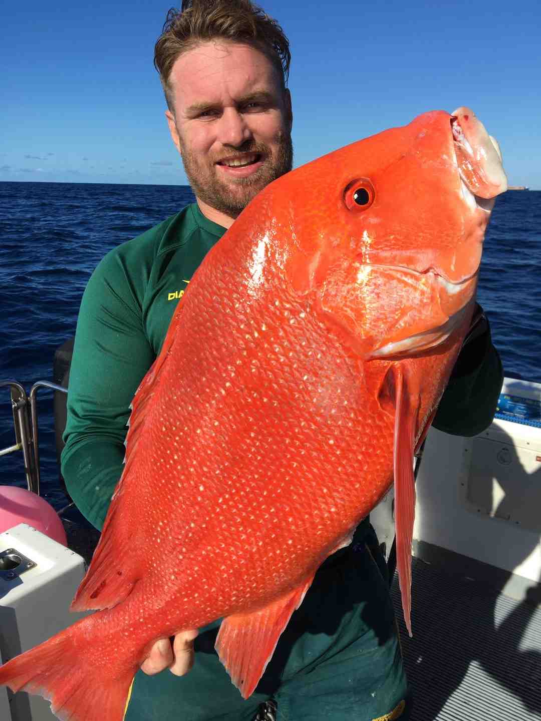 Ben with his personal best Red Emperor caught fishing on Baitrunner