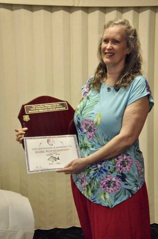 Margie receiving the trophy for Biggest Bream on behalf of her late husband, Mark Wotherspoon. Mark was a very much loved and respected member of the TCBFC who passed away suddenly last year