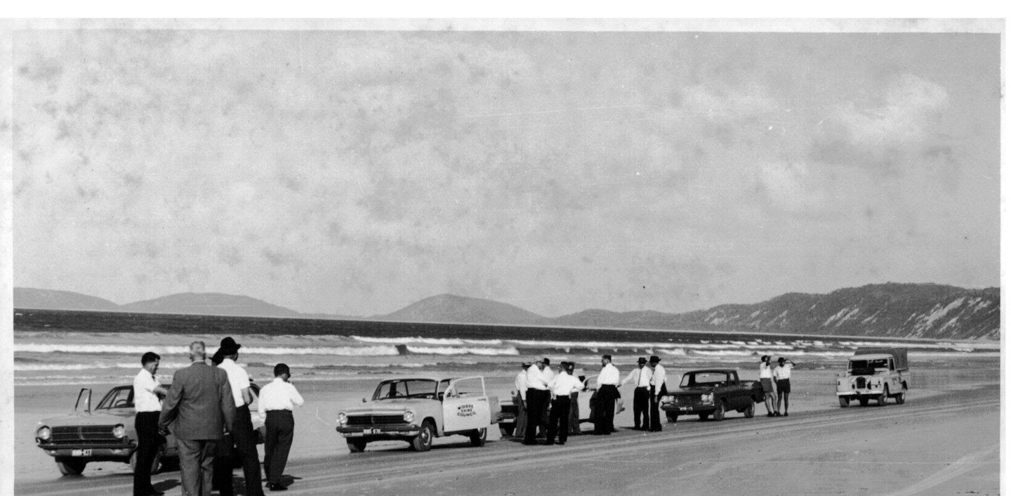 Premier Frank Nicklin (Sir George Francis Reuben Nicklin) with The Honourable Max Hodges MP at the opening of the Rainbow Beach Surf Club - note the old Widgee Shire Council Holden Ute – for the 1965/66 season (supplied Garry Hewitt)