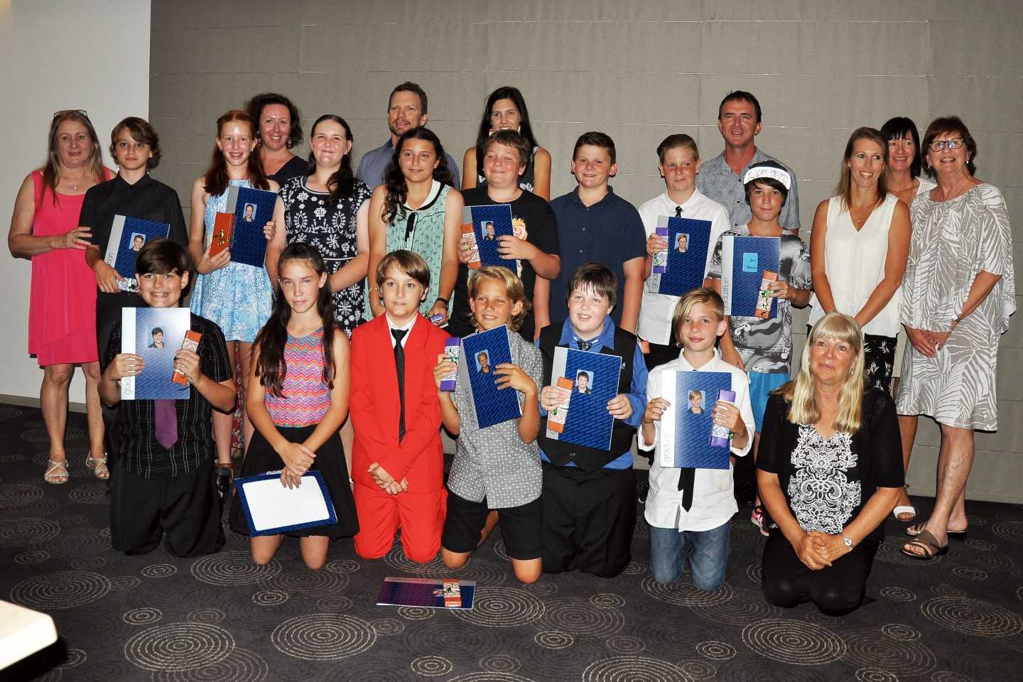 Staff in the back row: Lynne Chamberlain, Sarah Brantz, Principal Dan Stanieg, Yasmin Sauer, Andrew Walsh, Tina McColl, Cate White and Therese Young Middle Row: Clive, Sophie, Mikayla, Elva, Mark, George, Kaleb, Joel Front Row: Chase, Charlotte, Oscar, Nathan, Ethan, Bailey and Chappy Ronnie Timperon  Image Hans Brantz