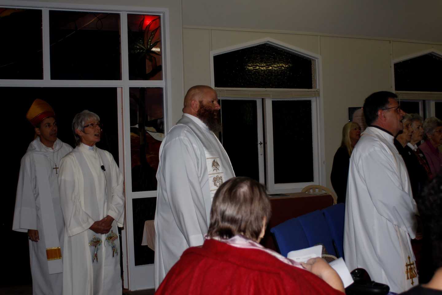 Regional Bishop Jeremy Greaves follows Reverend Ingrid Busk into the Good Shepherd Church for her Commissioning 