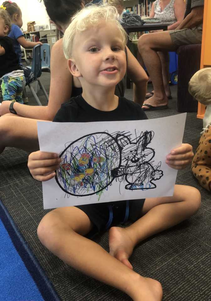 Kasey-Cruze shows off his artwork