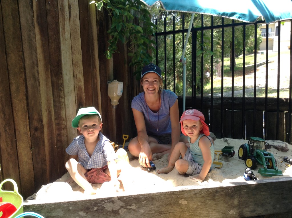 Family day care educator, Kim, having fun with James and Henry