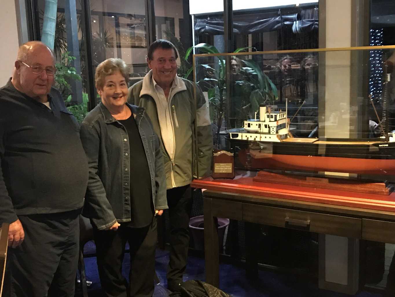 Gary Splatt, Maureen and Sam Mitchell from 7th Wave are happy to have the Natone on display at the Sports Club for everyone in Rainbow Beach to enjoy