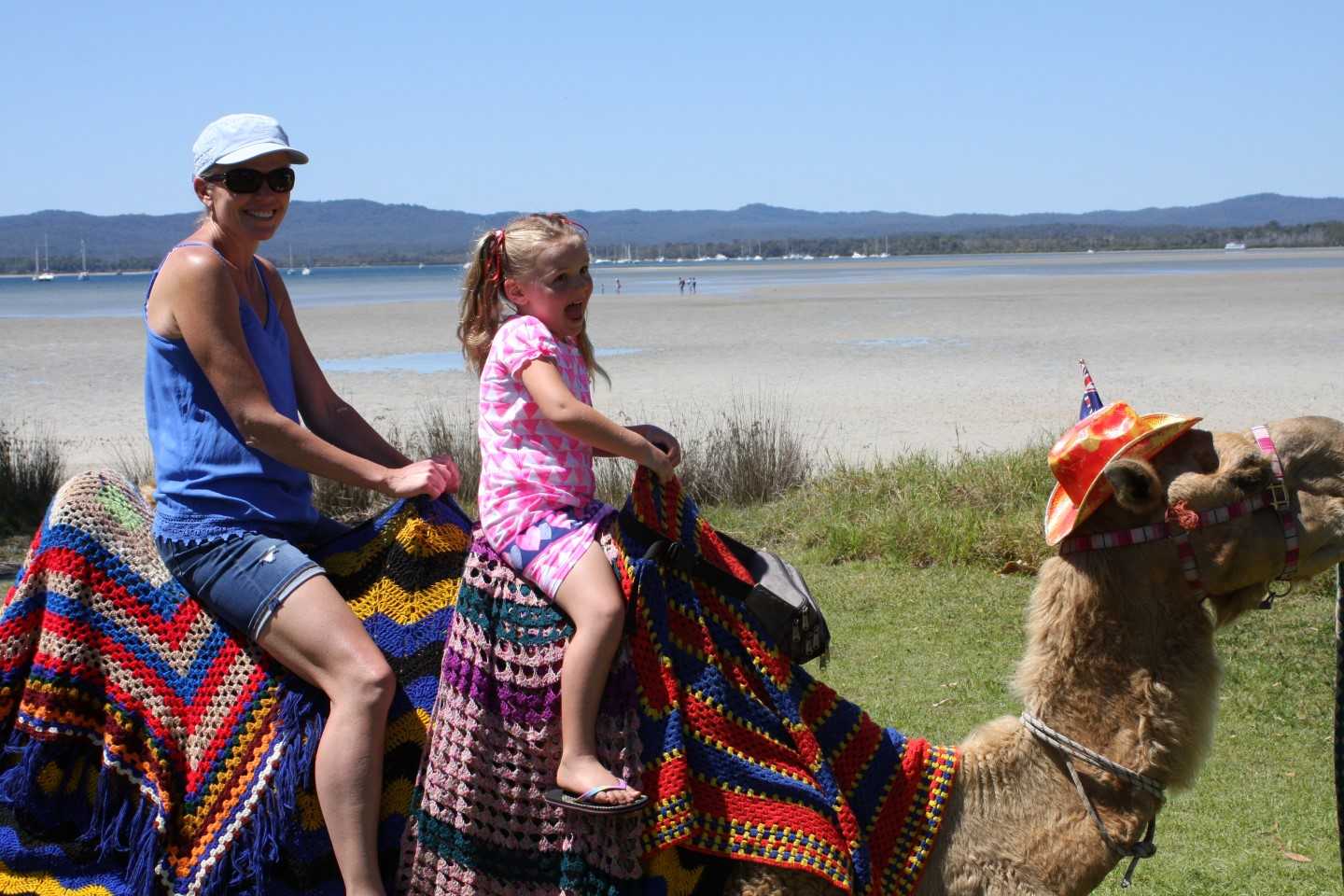 The 2017 Tin Can Bay Seafood Festival is set to be the best yet. Wynetta and Skye Duggan took the camel train around the foreshore last year, and the day out is definitely one of the highlights of the year!