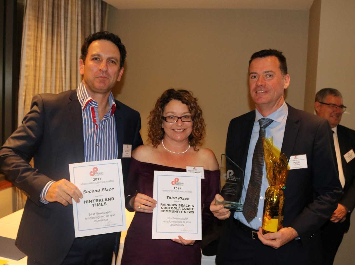 Across three categories of Best Newspaper in Country Queensland 2017, Michelle and Heatley Gilmore won two second places for the Hinterland Times, and a second and third place for Rainbow Beach Cooloola Coast Community News - and are pictured with winning newspaper Noosa News owner Paul Thomas