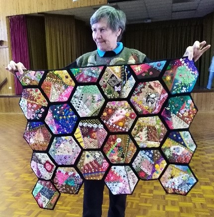 Louise with her beautifully designed quilt