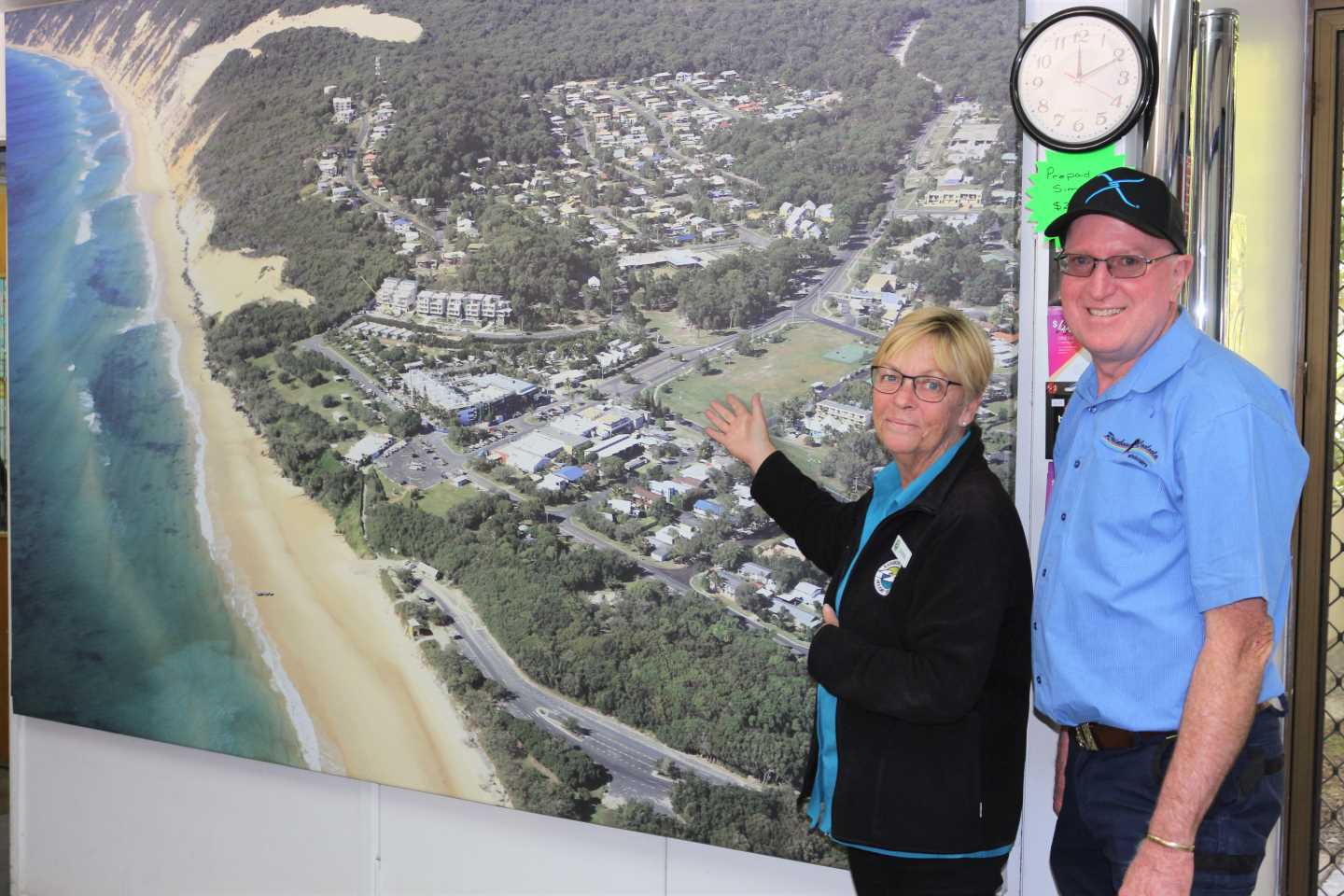 New owner Michiel Pratt with one of his customers, Rainbow Beach Holiday Village’s Janine Kent, showing Michiel the changes to the coast