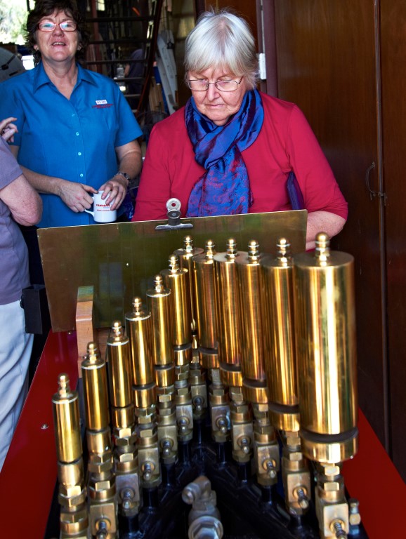A rather intense Marg trying to master the steam calliope at Olds Engine Shop