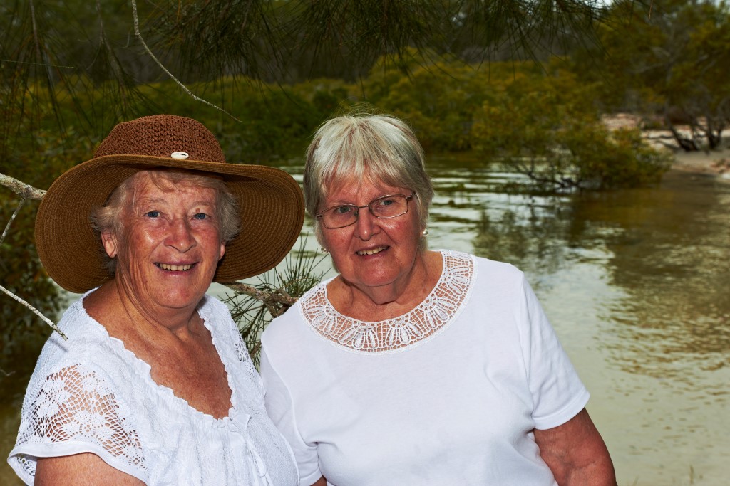 Carmel and Margaret in front of the swimming spot at the picnic area at Bayside Park, Cooloola