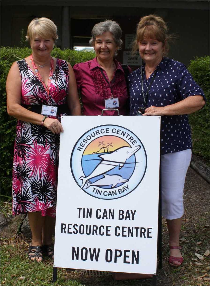 Volunteers Gabriella Field, Lynette Cunningham and Eileen Hollyoak show off the Resource centre's brand new sign