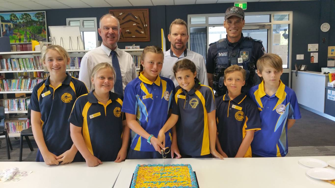 Tony Perret, Principal Danny Stanieg and Michael Brantz congratulate school leaders, Laila, Mason, Luxie-Leigh, Tia, Max and Jasper