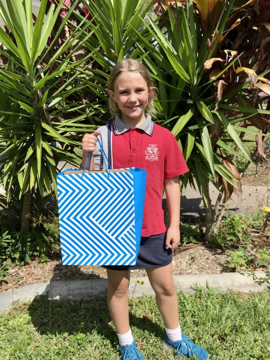 Kaylee with her prize from the Flower Show
