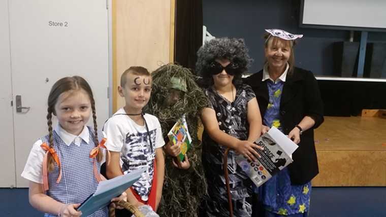 Book Week Fancy Dress winners: Xanthe-Leigh Sheridan, Noah Duncan, a well camouflaged student, Logan Smith and Library Teacher Aide, Mrs Sue Dan