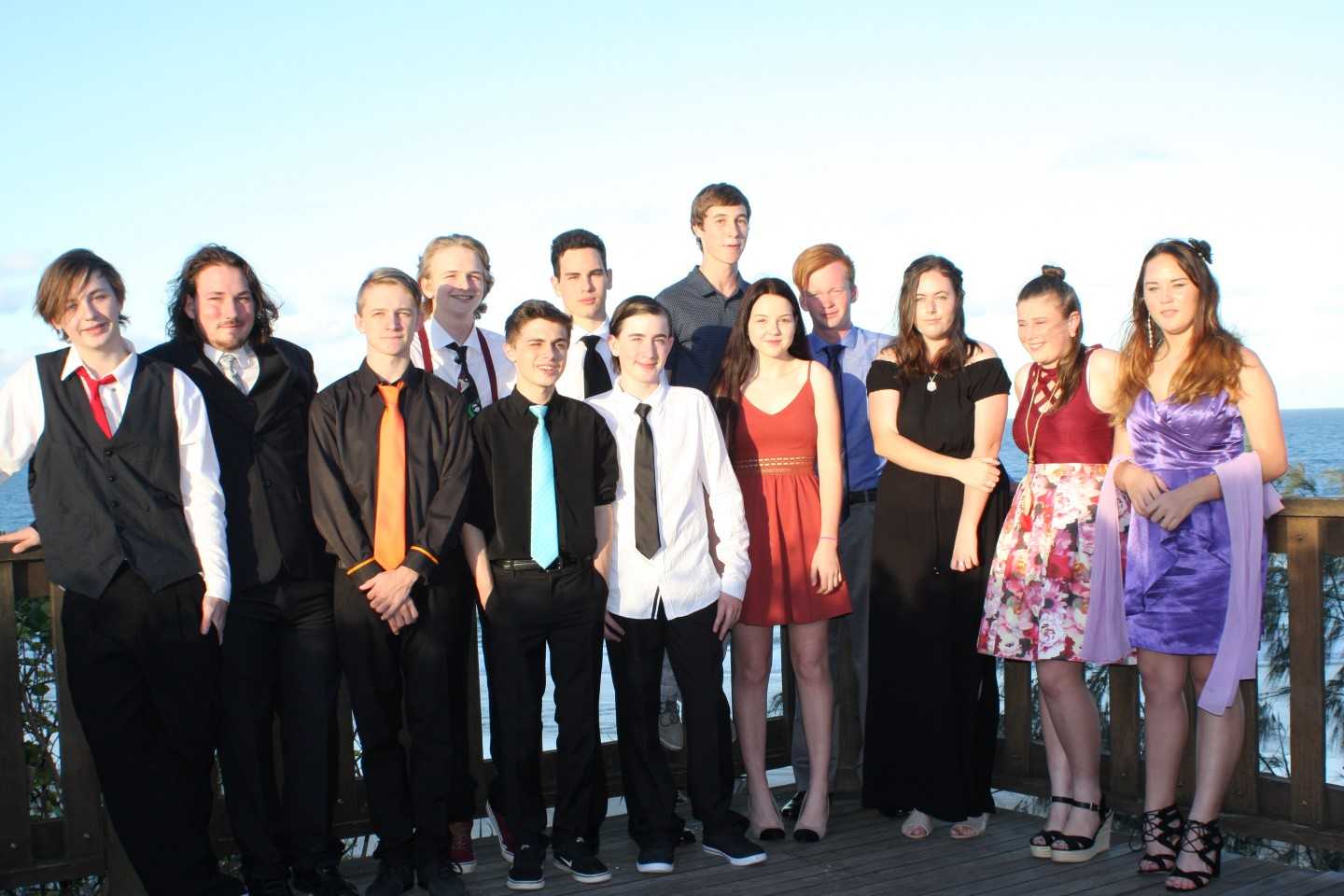 Year 10 Graduates from Tin Can Bay P-10 School pose for photos at the propeller, before they celebrate further at the Sports Club.