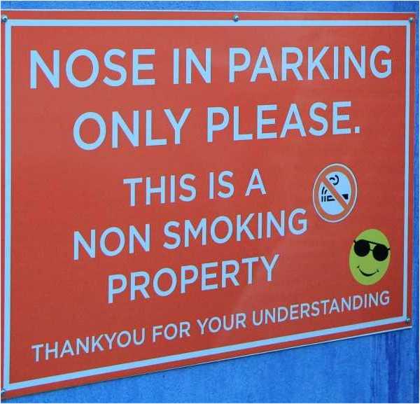 Signage outside the Top Shops in Rainbow Beach has decreased smoking at the venue, cigarette butt littering, and complaints from patrons, and could be extended into the main street Image Barb Rees