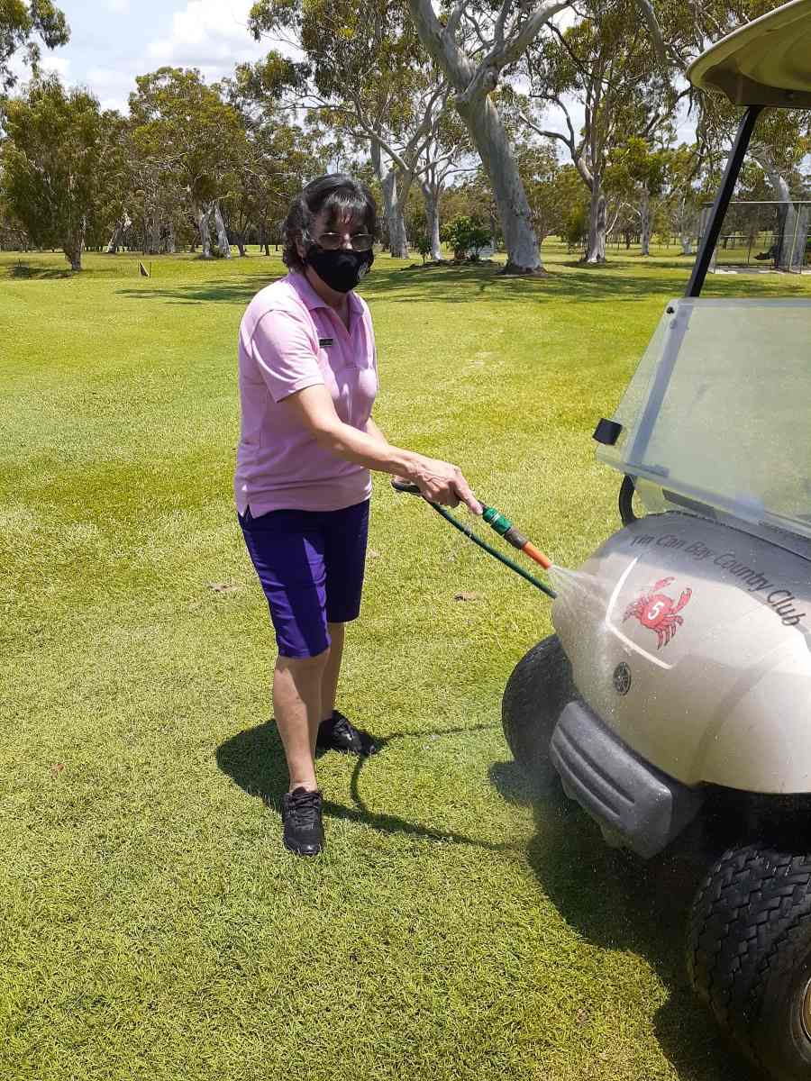 Pro Shop employee Phil Poldervaart employee taking care of the hire buggy
