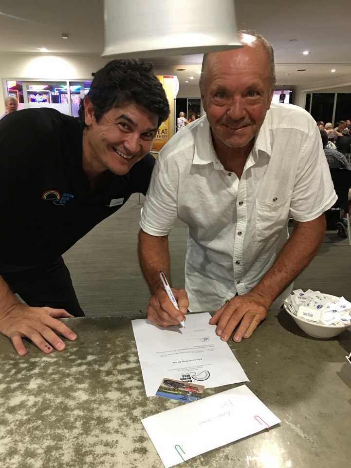 Cory Burke presents local Paul Badcock with the &#36;1500 membership draw winnings!
