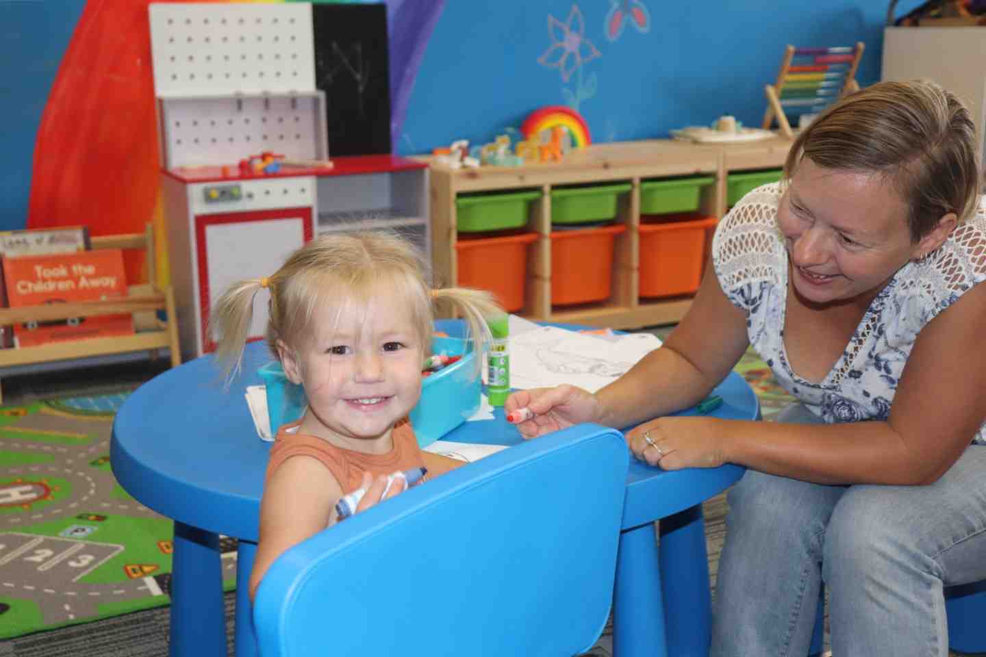 Riah plays with mum Shae at Rainbow Beach Playgroup