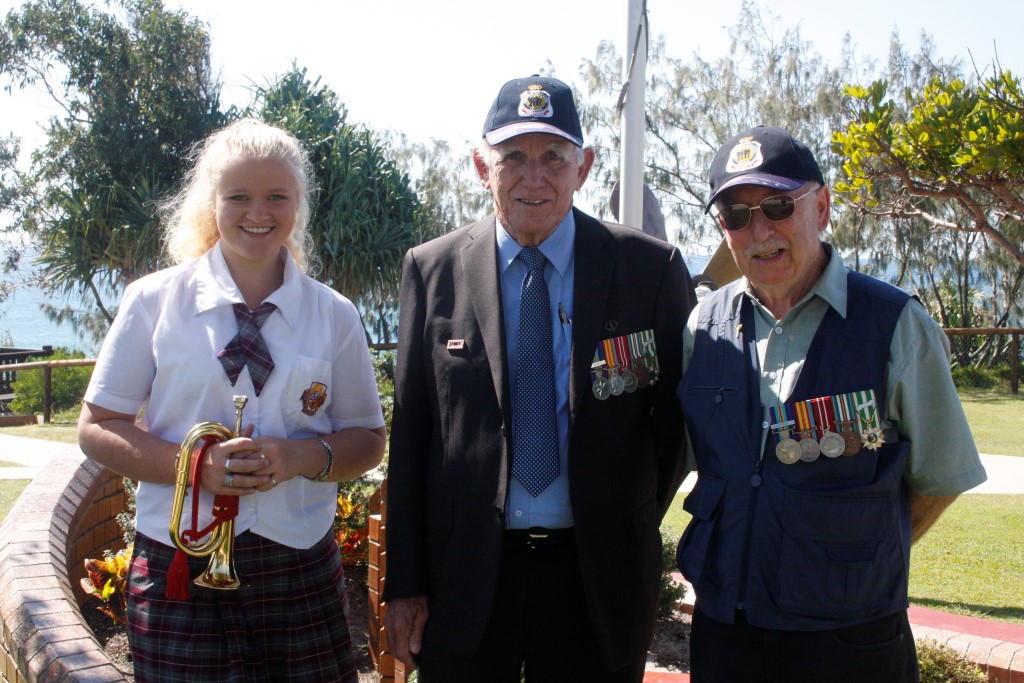 Bugler, Jamie Lee Griffiths, her grandfather Reverend Bruce Dorman and RSL sub-branch executive President Joe Casey led the V