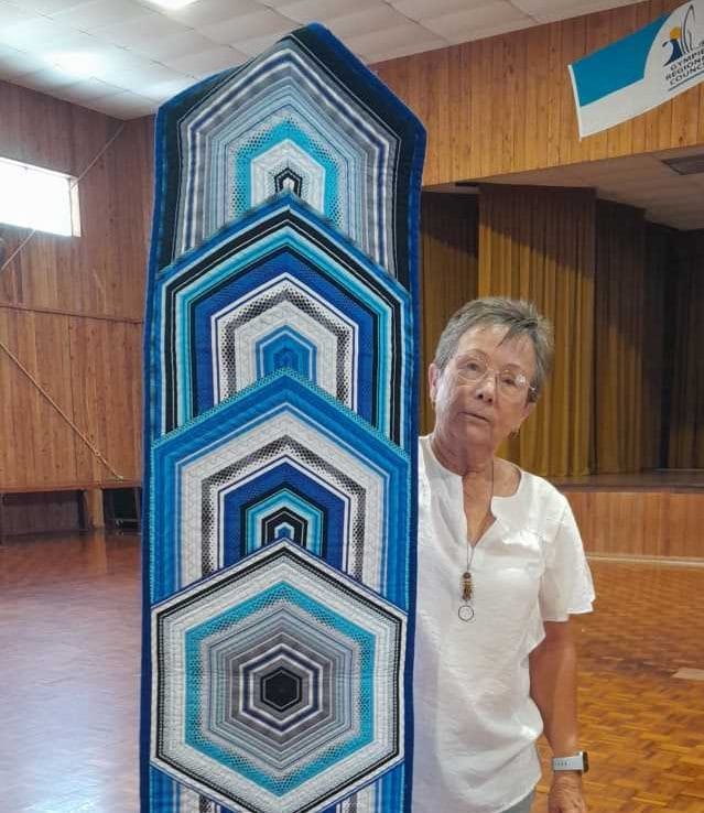 Quilters - Jo showing us her recently finished table runner