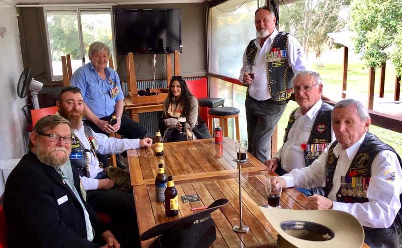 President Don Holland enjoying a well-earned drink with members of the Eureka Mob of Vietnam Veterans after last year's comme