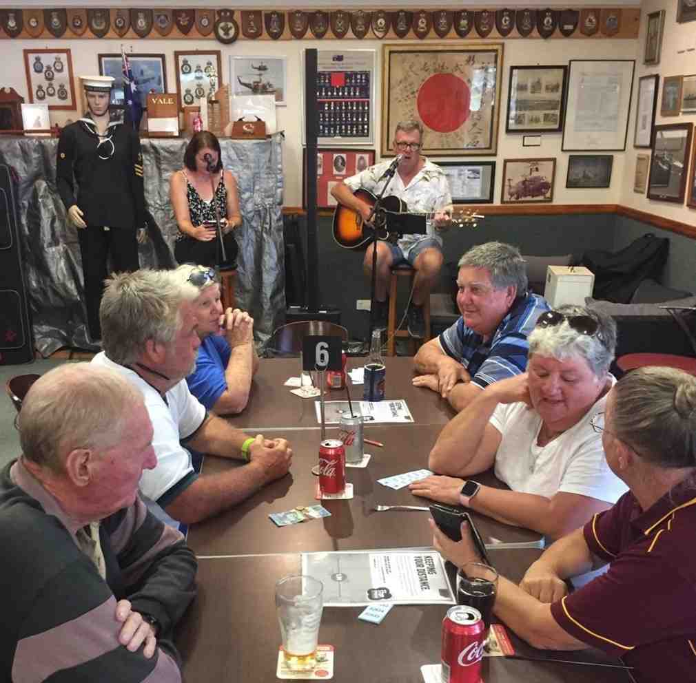 Patrons enjoying Sunday's BBQ on the deck with music at the Tin Can Bay RSL