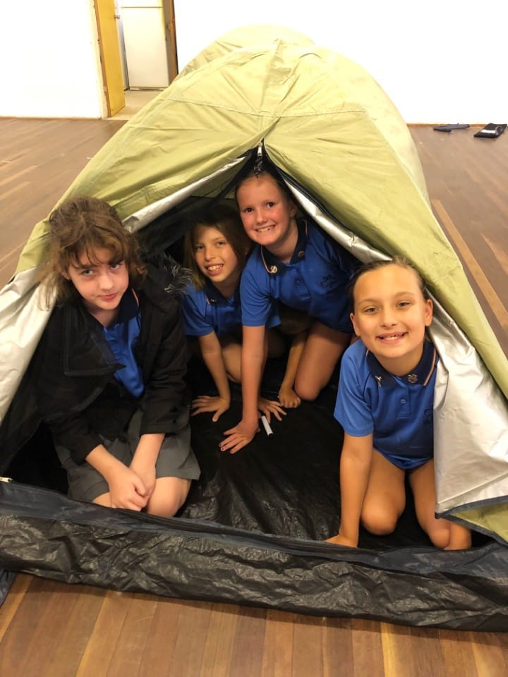 Aaliyah, Sophia, Chloe and Indiana from the Cooloola Coast Girl Guides perfecting their tent skills