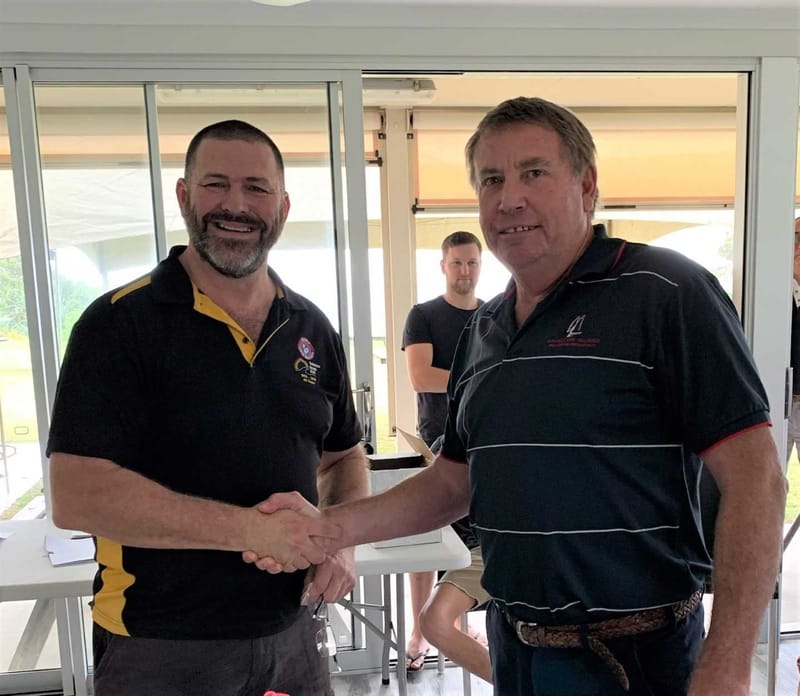 Shane Handy being congratulated by life member Kim McCarthy at the surf club AGM last month after receiving his Life Membersh