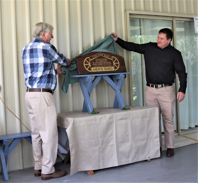Pictured raising the presented State Flag at the Men’s Shed Opening were Graham Langdown, President; Llew O'Brien - Federal M