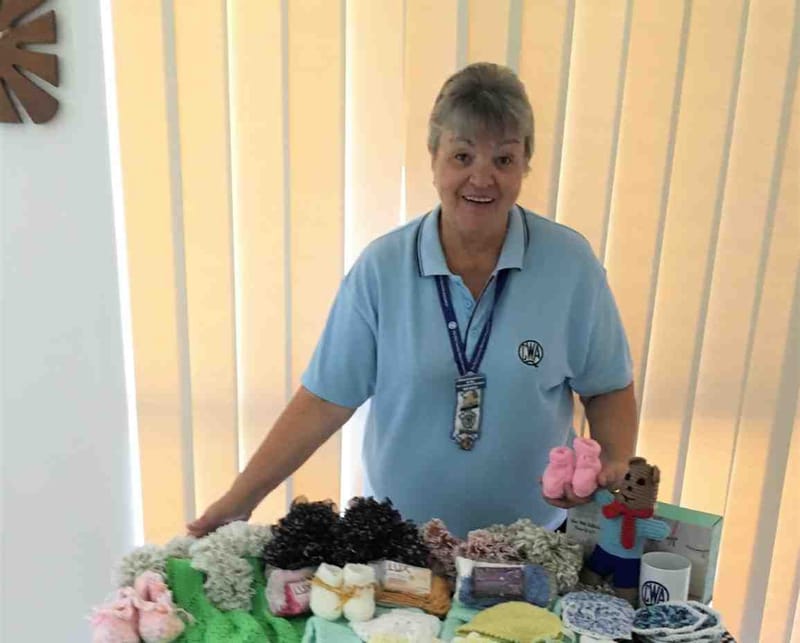 QCWA President Wendy receiving handmade items made by members going to those in need - great work ladies of the QCWA