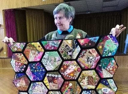 Louise with her beautifully designed quilt