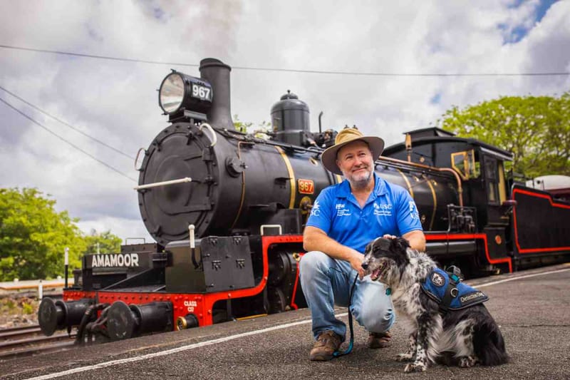 Russell Miller with Detection Dog Maya testing out the ‘Pets on Board’ service on the Mary Valley Rattler