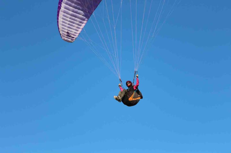 Hang gliders are a regular sight at Rainbow Beach - maybe it's time to give it a try after you learn to dive?
