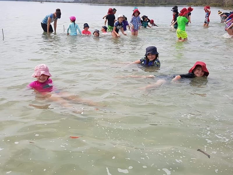 Tin Can Bay students enjoying the water at the foreshore