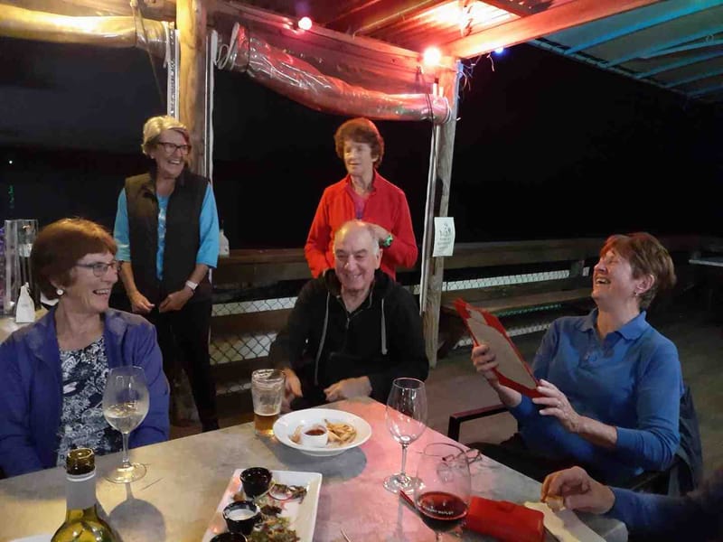 Octogenarian Norma Sanderson celebrating with fellow Dragons and friends at TCB Yacht Club: Andra Casey, Pam Corey, Vic Vella