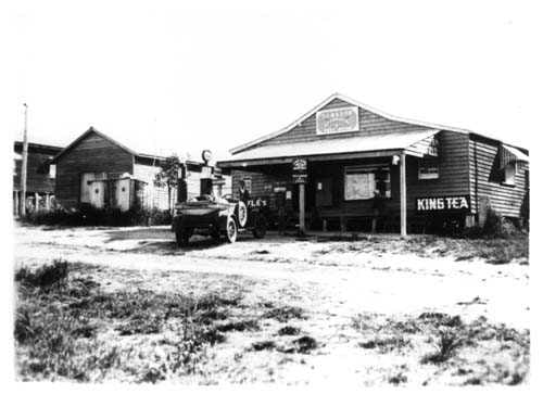 Viv Mason’s shop with the community hall on the left.